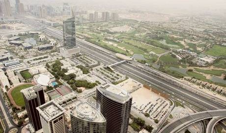 A view of Up left to right, Tecom and Emirates Golf Club, and down Dubai Marina, and Sheikh Zayed road in Between.